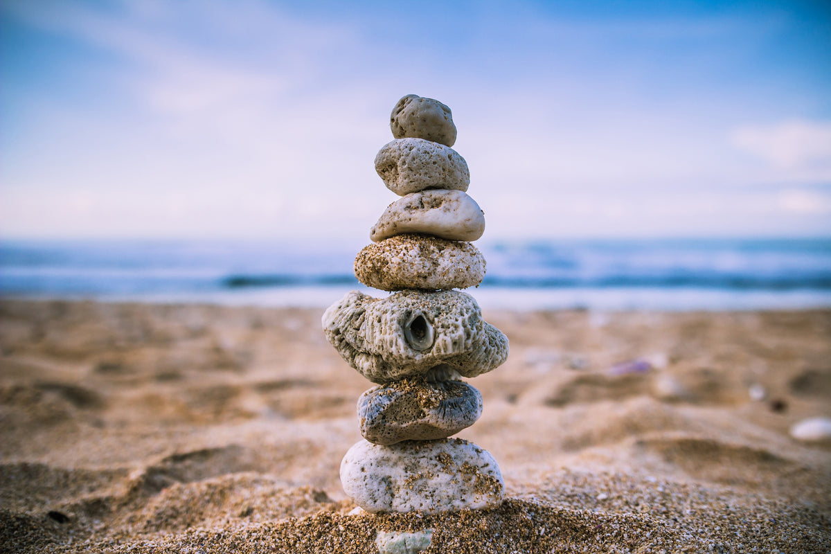 3-piece-aluminium-print-stone-pile-on-the-beach