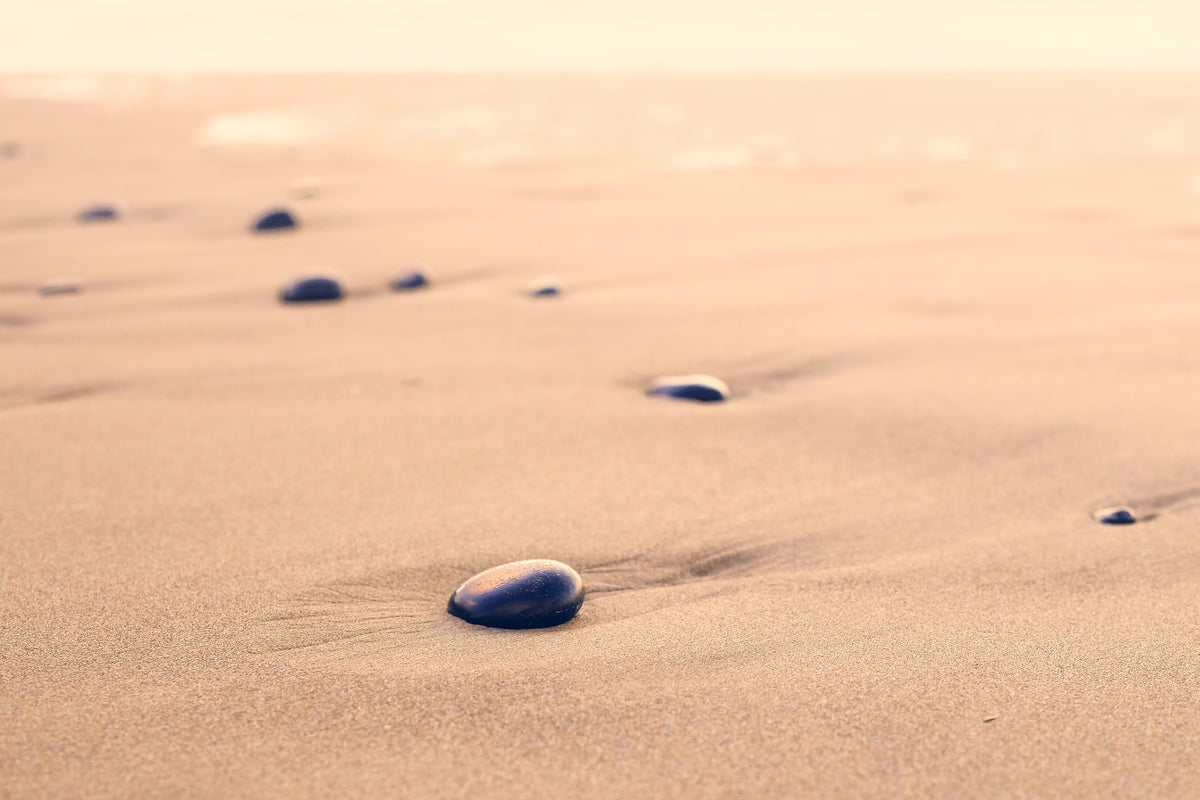 3-piece-canvas-print-pebbles-in-the-sand